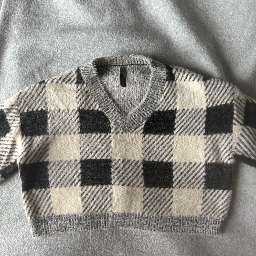 Alya Francesca’s cropped checker/plaid sweater